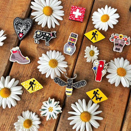 Swiss themed wooden pin badges - The Kindest Design Studio