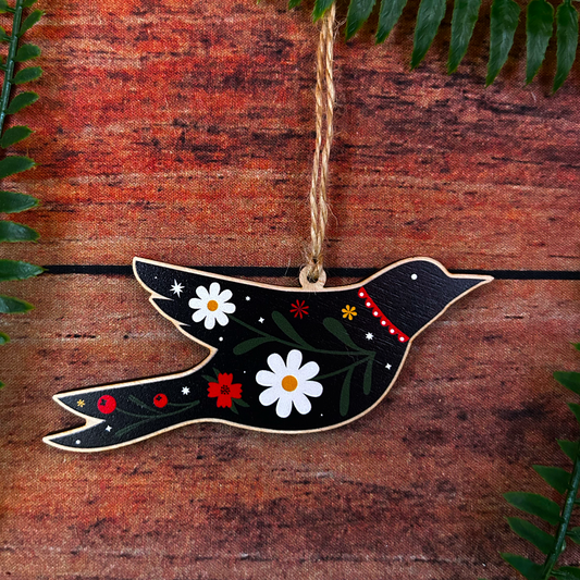 Decorative folk art bird illustration on wooden decoration