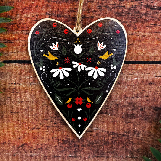 Folk art inspired floral illustration on wooden decoration