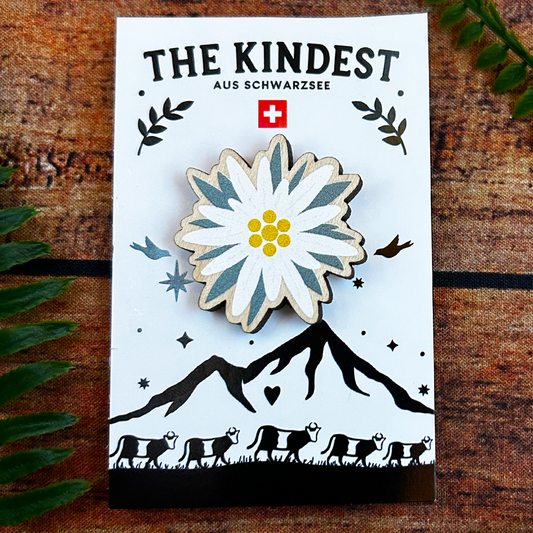 swiss edelweiss wooden pin badge on backing card, switzerland souvenir