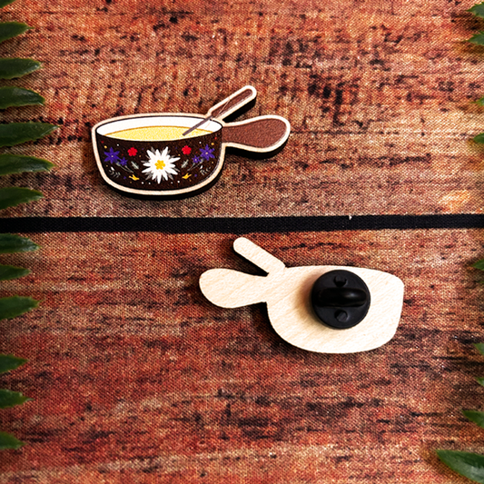 edelweiss adorned fondue pot wooden pin badge