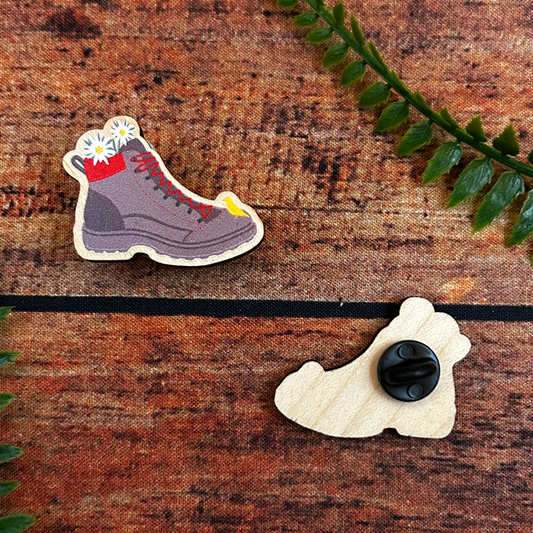 hiking boot illustration wooden pin badge with swiss edelweiss