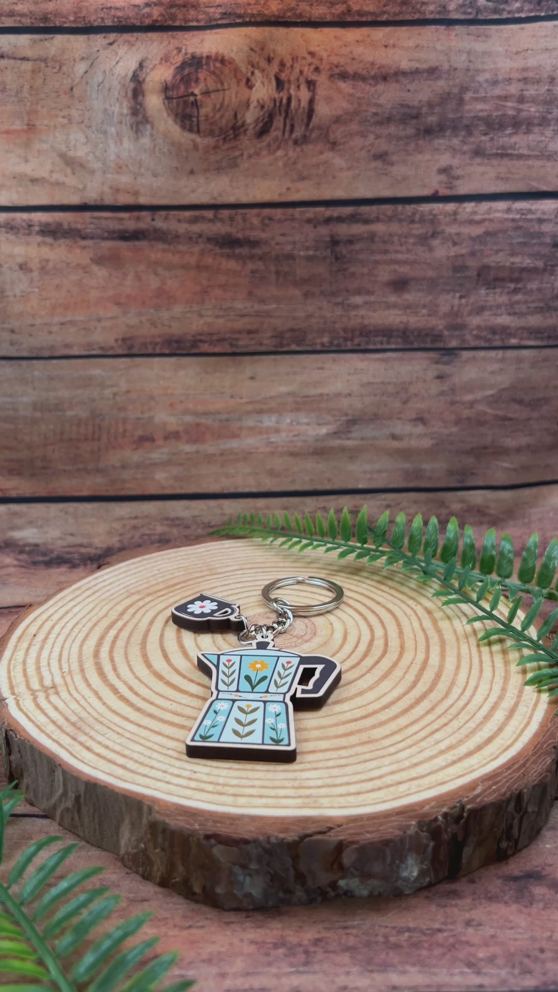 video of a floral retro style coffee pot keyring
