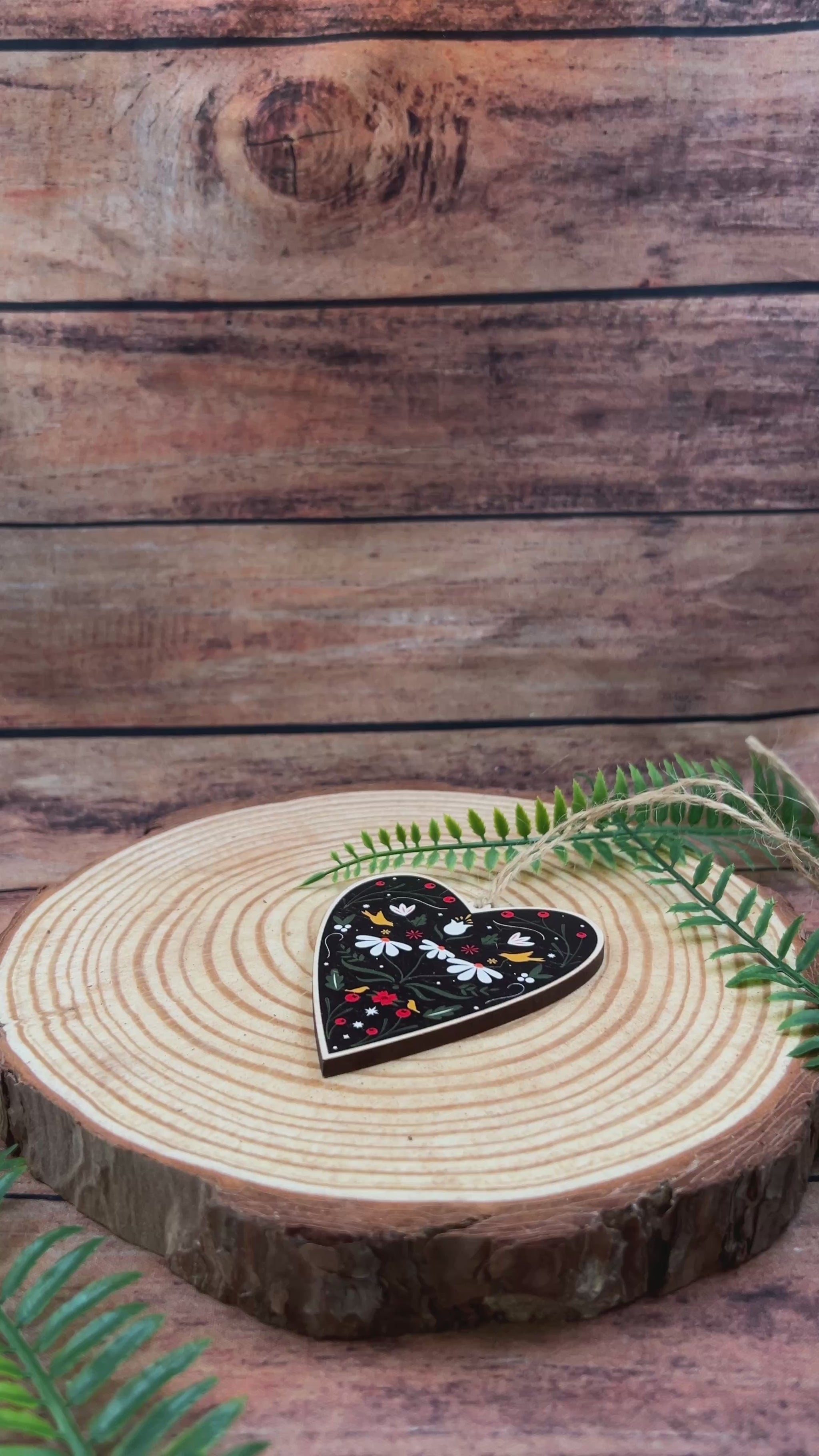 video of a Folk art inspired floral illustration on wooden decoration