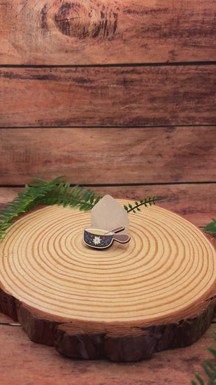 video of edelweiss adorned fondue pot wooden pin badge