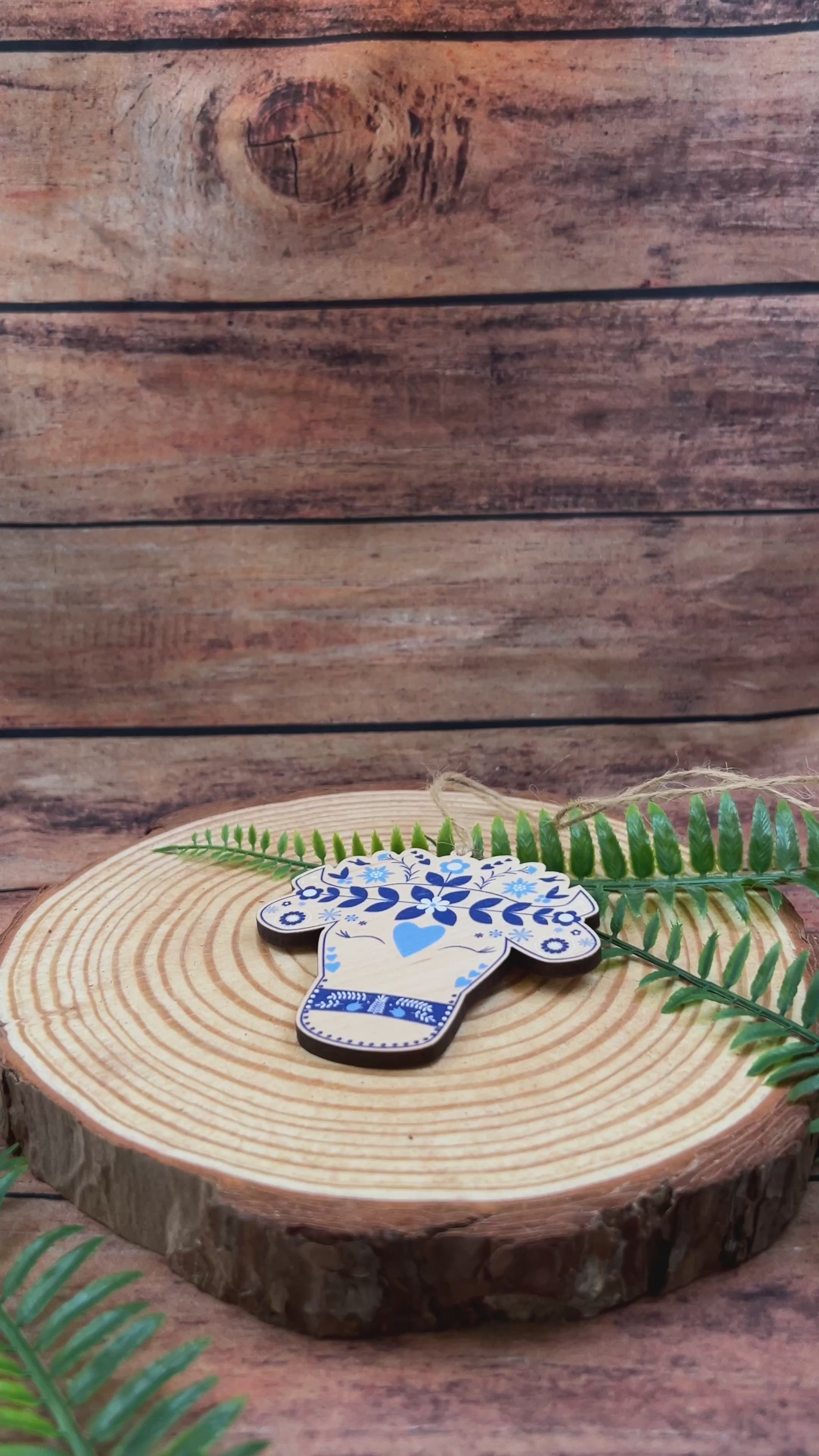 video of Modern Swiss alpine cow illustration on wooden decoration