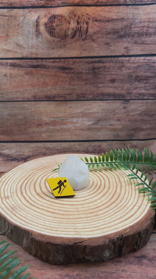 video showing illustrated wooden pin badge with swiss hiking trail wanderweg symbol