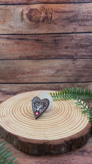 swiss papercut, decoupage, scherenschnitte design on wooden pin badge, switzerland souvenir 